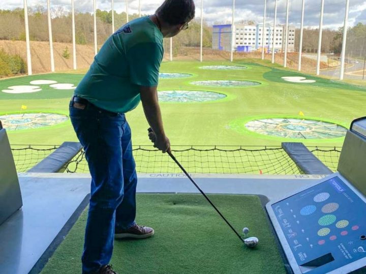 A dad is teed up to play at Top Golf Charlotte.