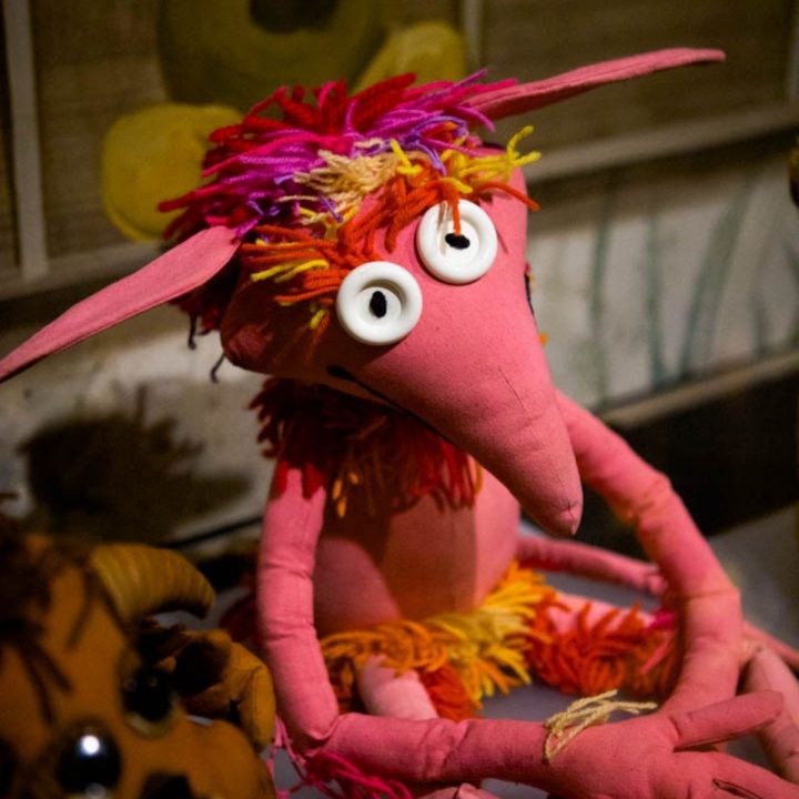 A red and pink puppet from the Labyrinth movie.