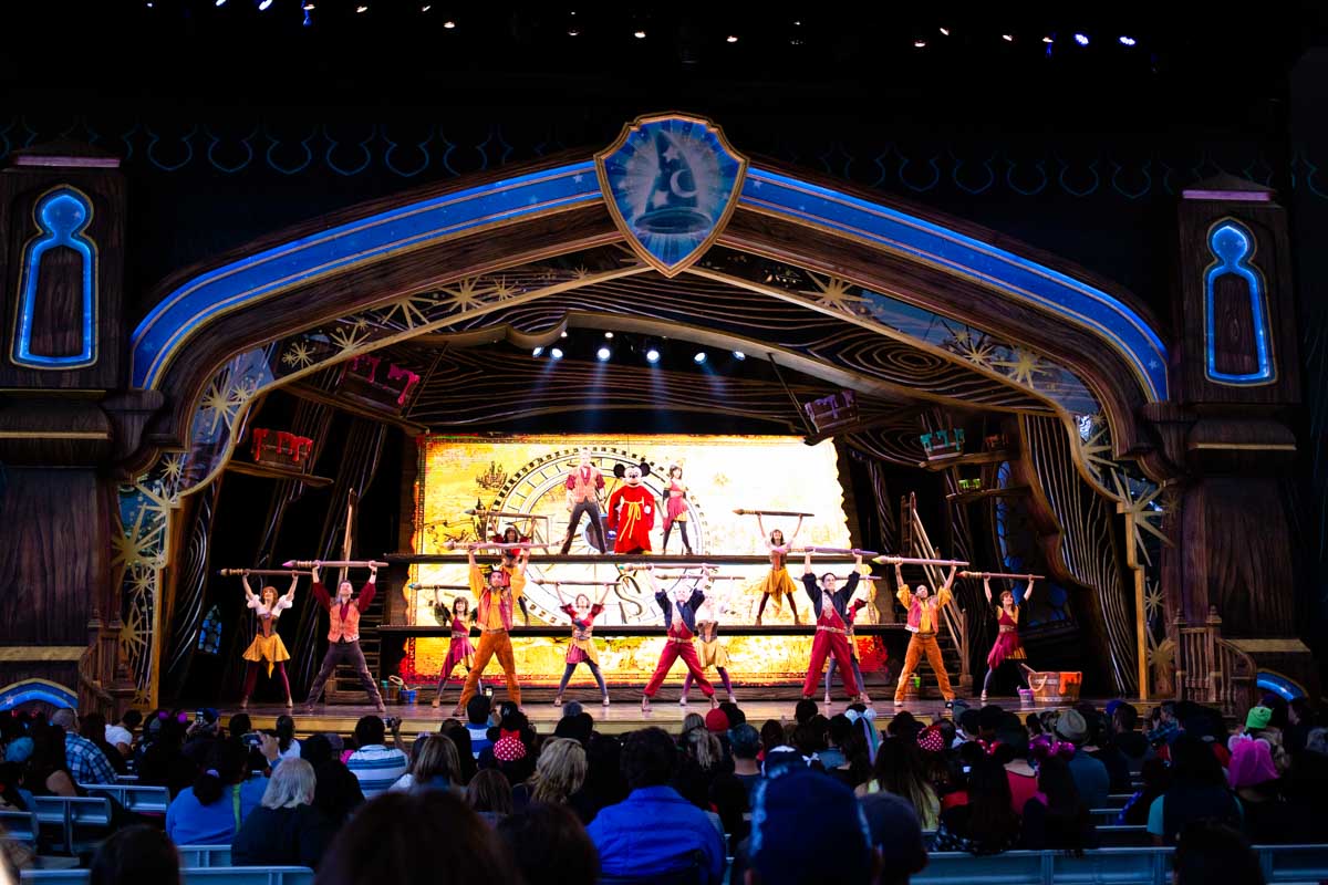 A live performance with characters on stage at Disneyland.