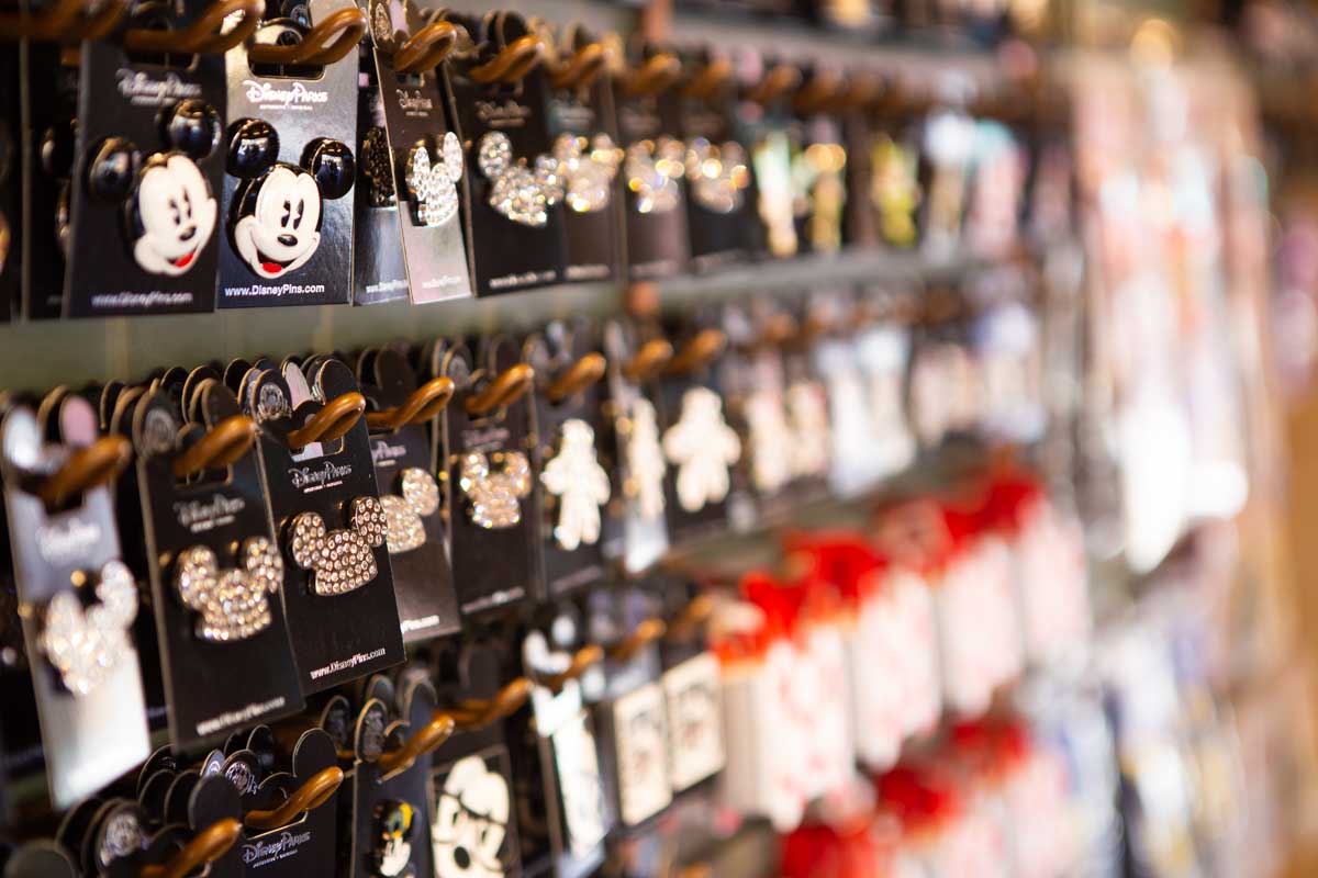 A wall of Disney pins at the store.