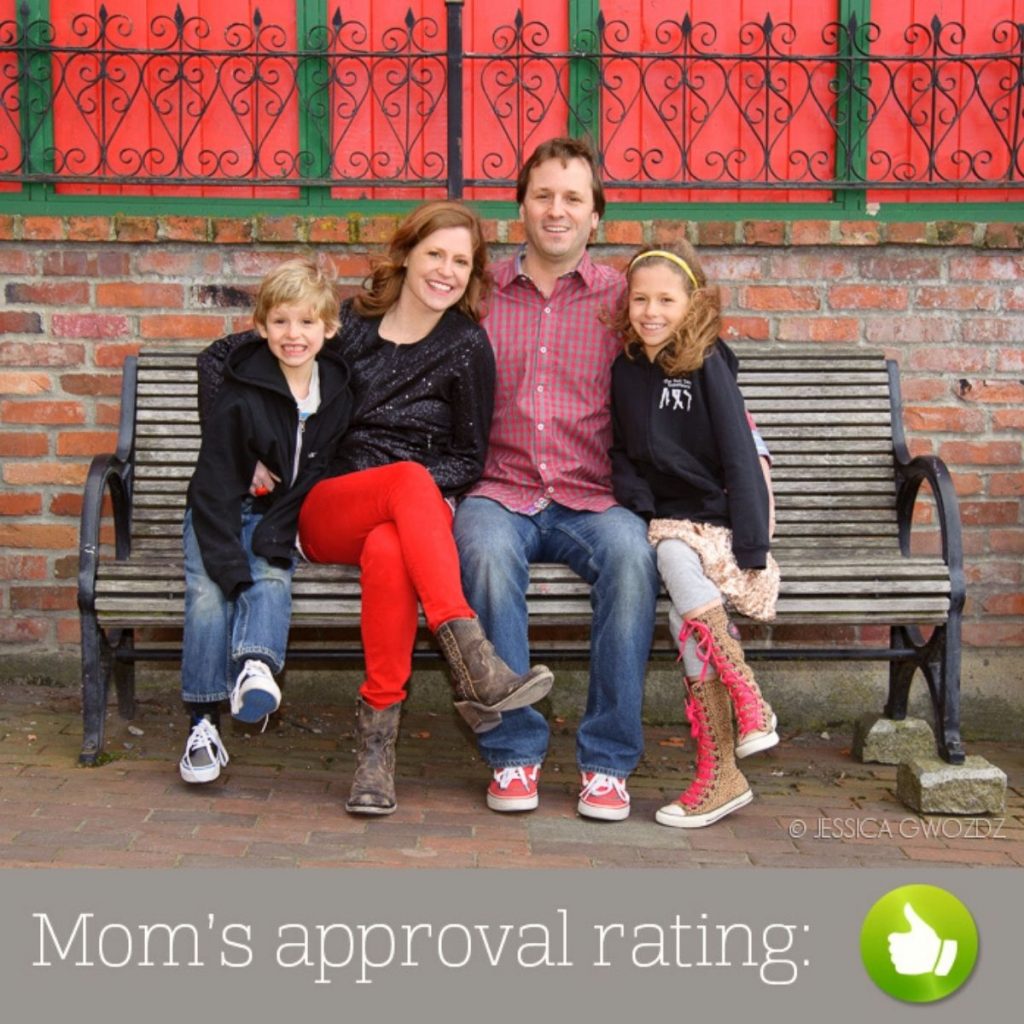 An example of how you SHOULD pose for a family vacation photo shows the family all touching each other shoulder-to-shoulder on a bench.