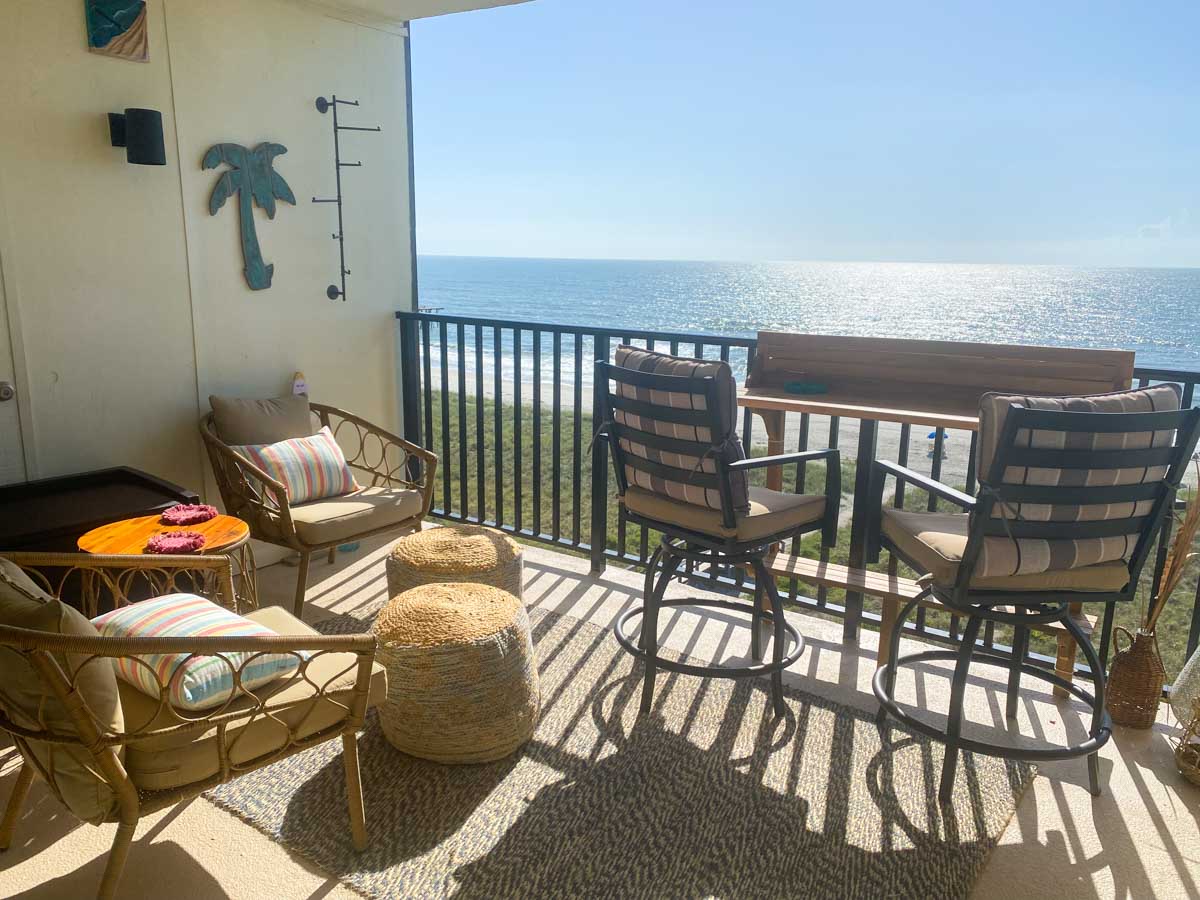 An ocean view balcony at a beach condo.