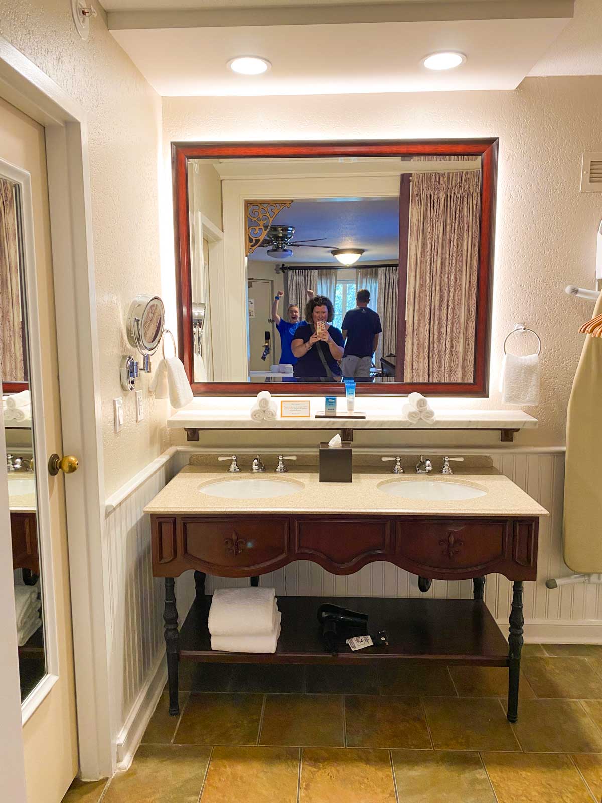 The bathroom vanity section of the guest room inside the hotel.