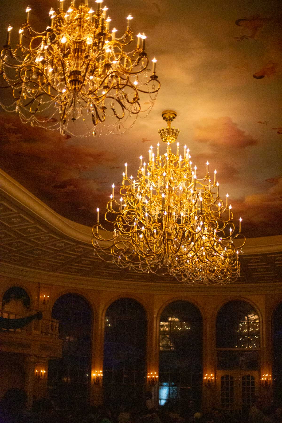 The gorgeous gold chandeliers inside the grand ballroom.