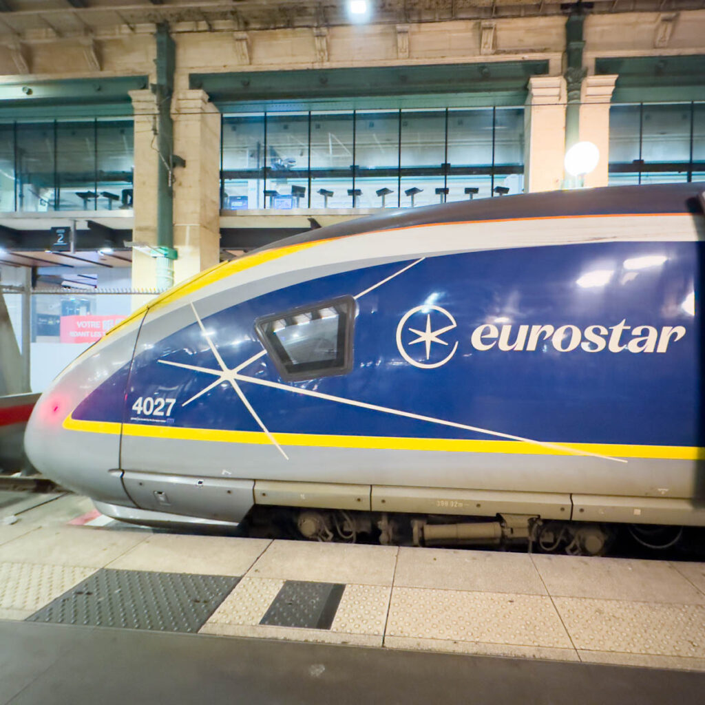 The Eurostar train is parked at the station.