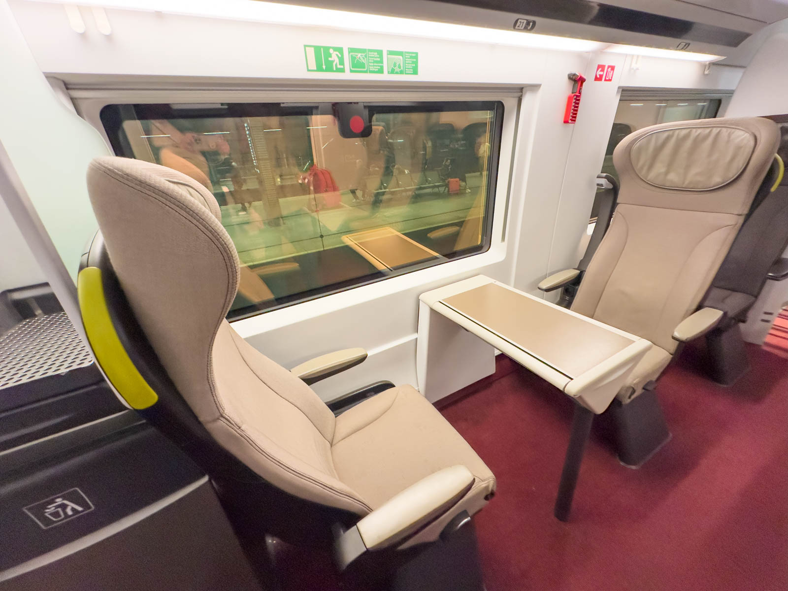 A set of 2 seats in the standard premier section of the train.