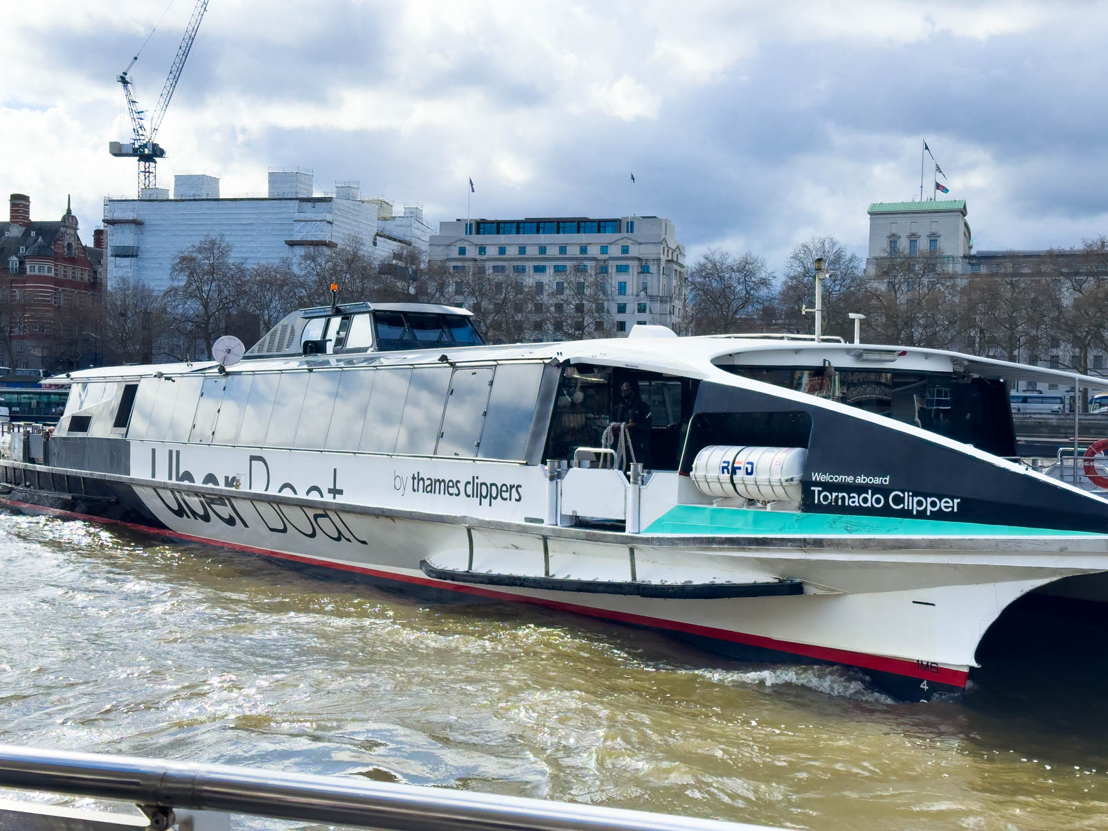 An Uber Boat on the Thames river in London.