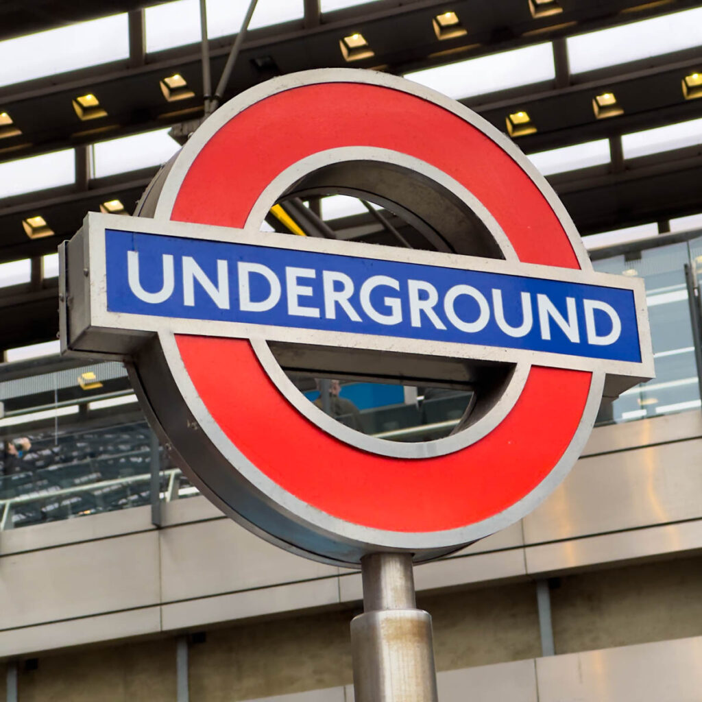 A red and blue circular sign that says "Underground."