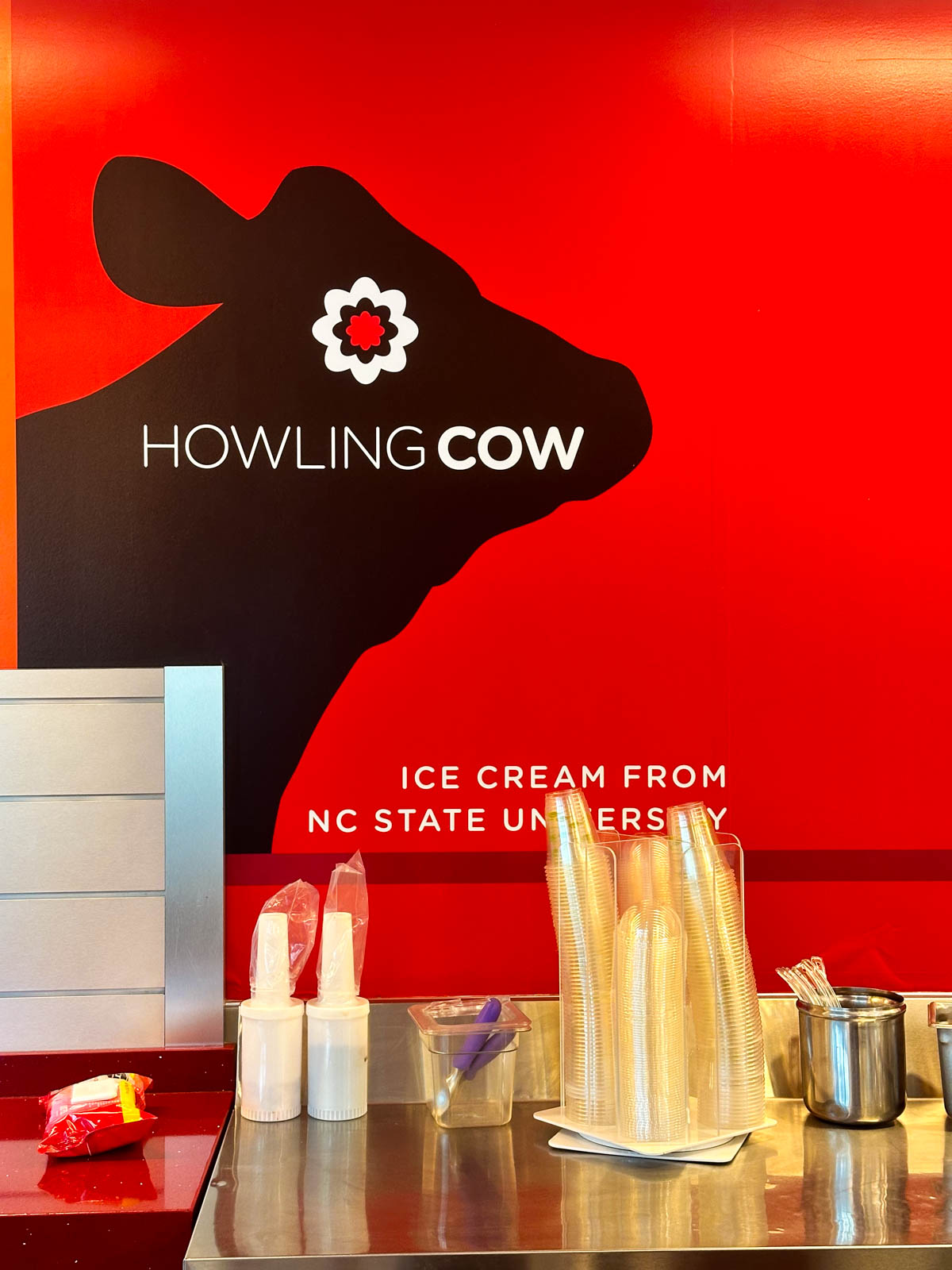 The Holy Cow sign in the ice cream shop.