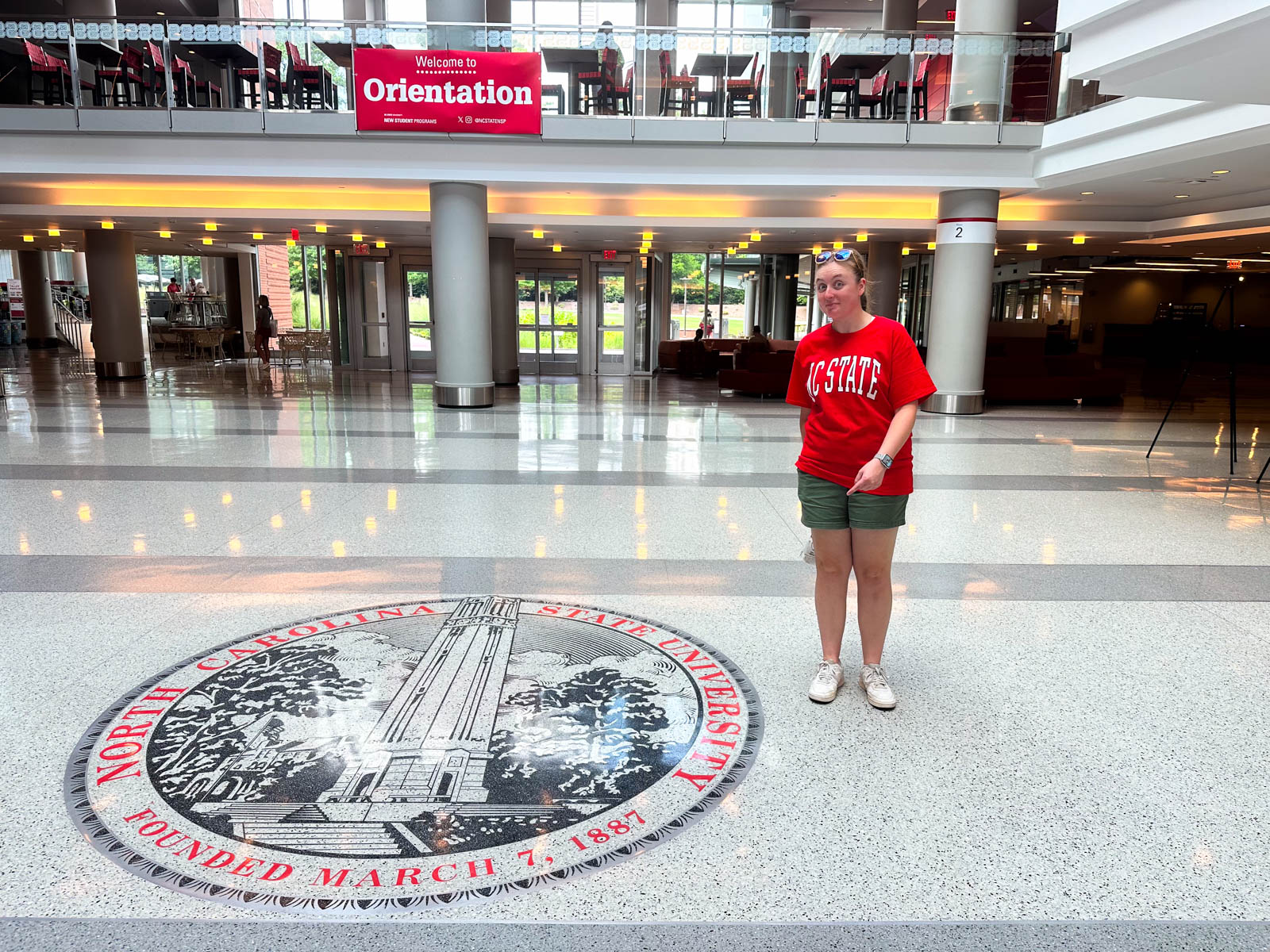 The seal on the floor inside the student union at NC State.