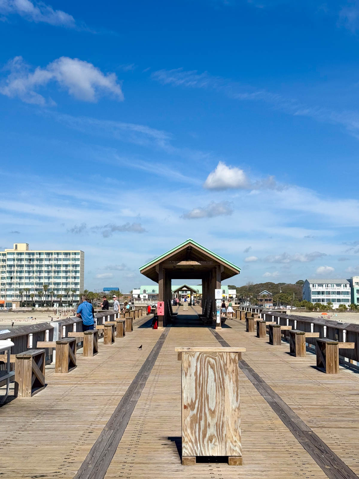 The fishing pier facing the beach.