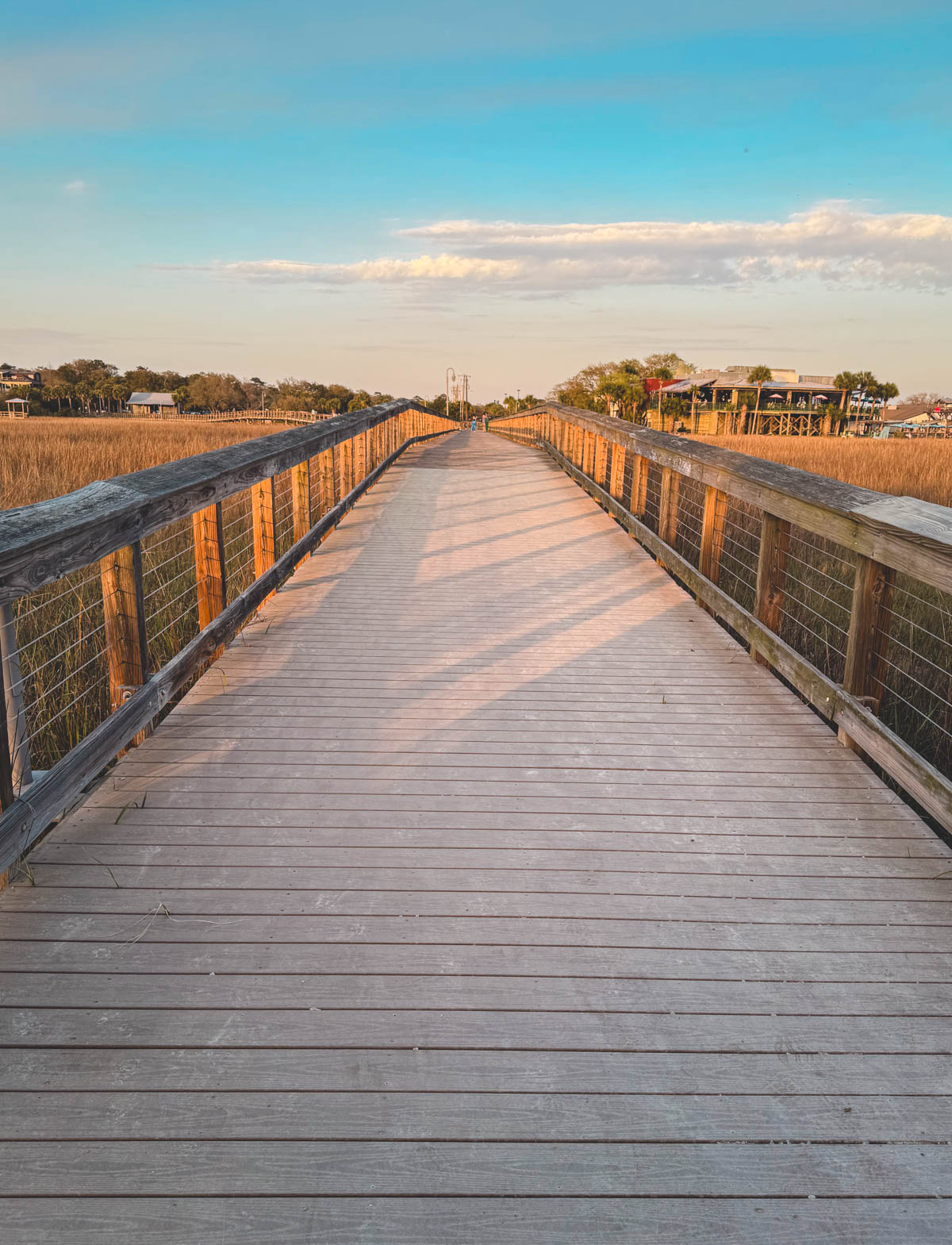 The board walk at Shem Creek at sunset.