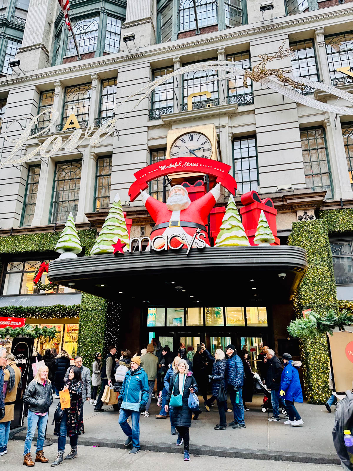 The front entrance to Macy's on 34th Street in New York  is decorated for Christmas.